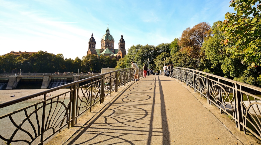 Riverside with bridge across the Isar River in Munich, Bavaria Germany Europe; Shutterstock ID 391279408
