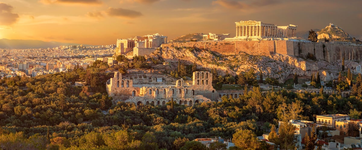 The Acropolis of Athens, including the Parthenon and other ancient ruins.