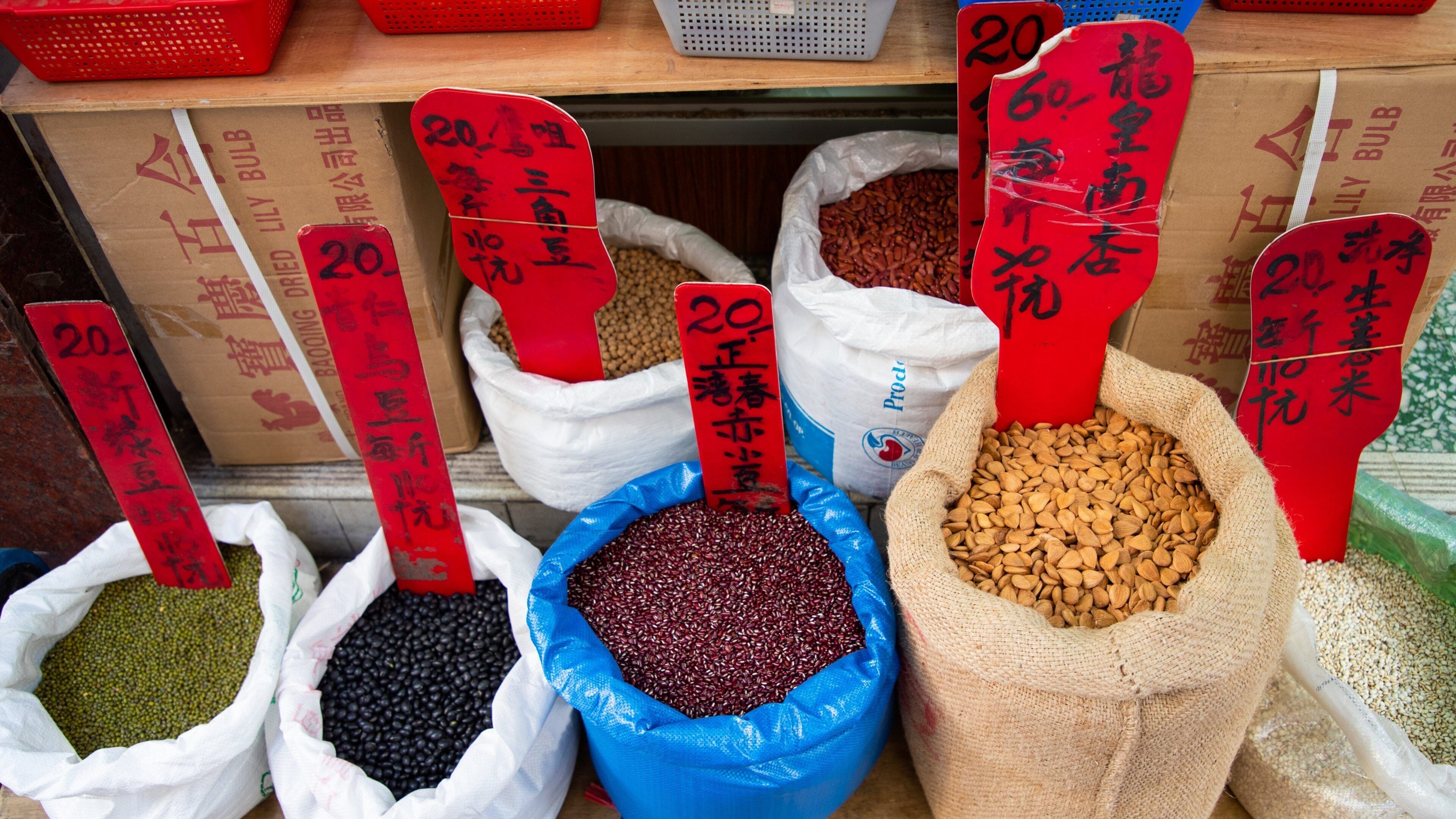 Sheung Wan featuring signage, food and markets