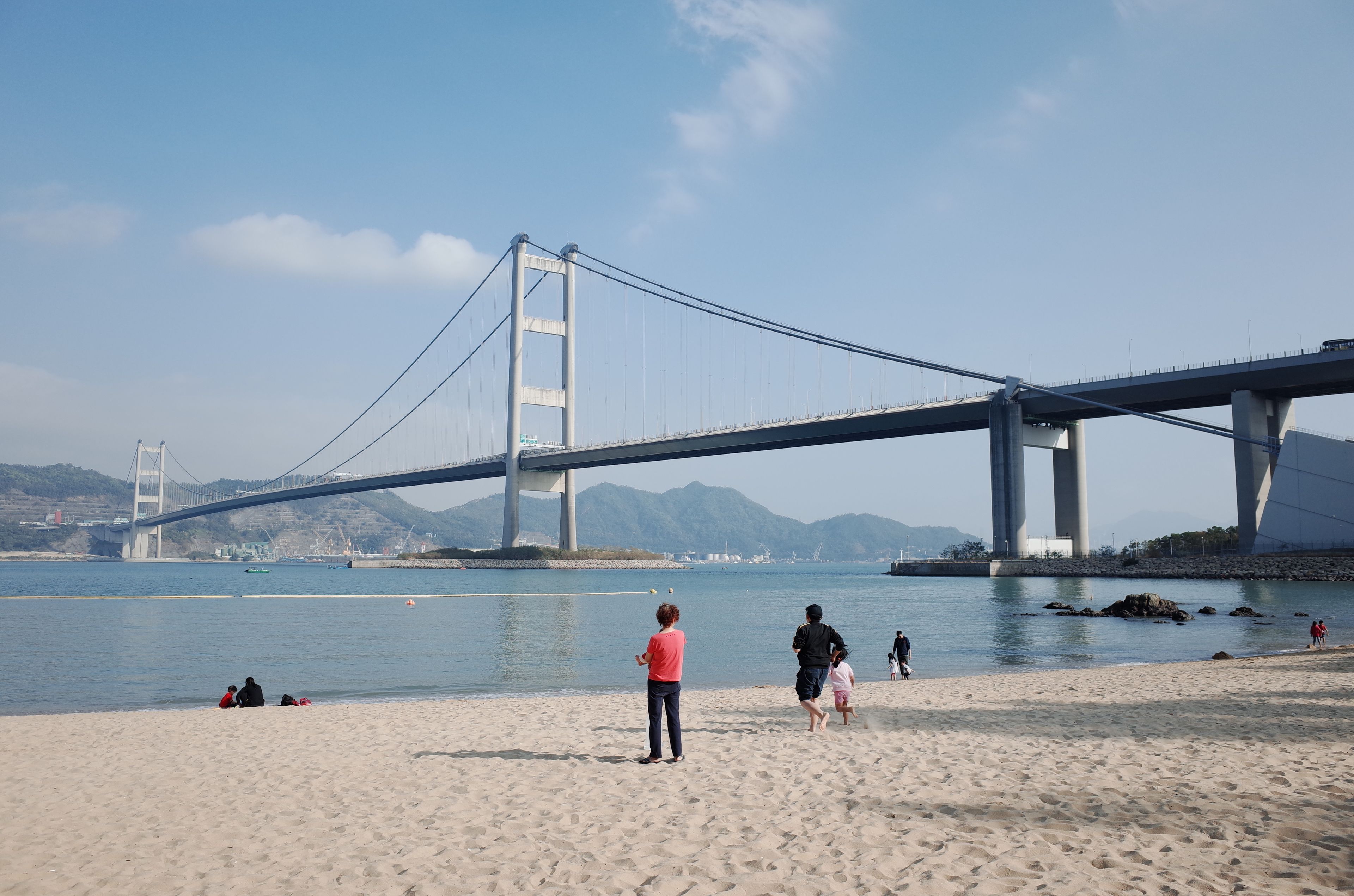 Tsing Ma Bridge in Hong Kong's Ma Wan Island, captured on a sunny day