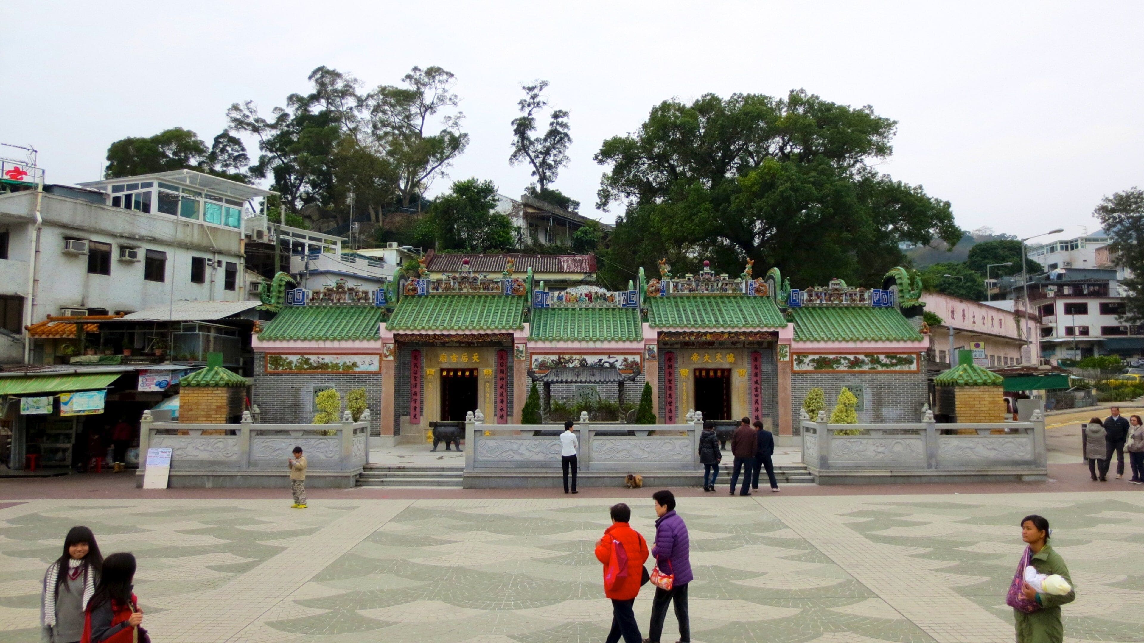 Sai Kung which includes a square or plaza, a city and a temple or place of worship