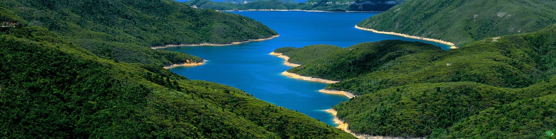 Sai Kung showing tranquil scenes, mountains and general coastal views
