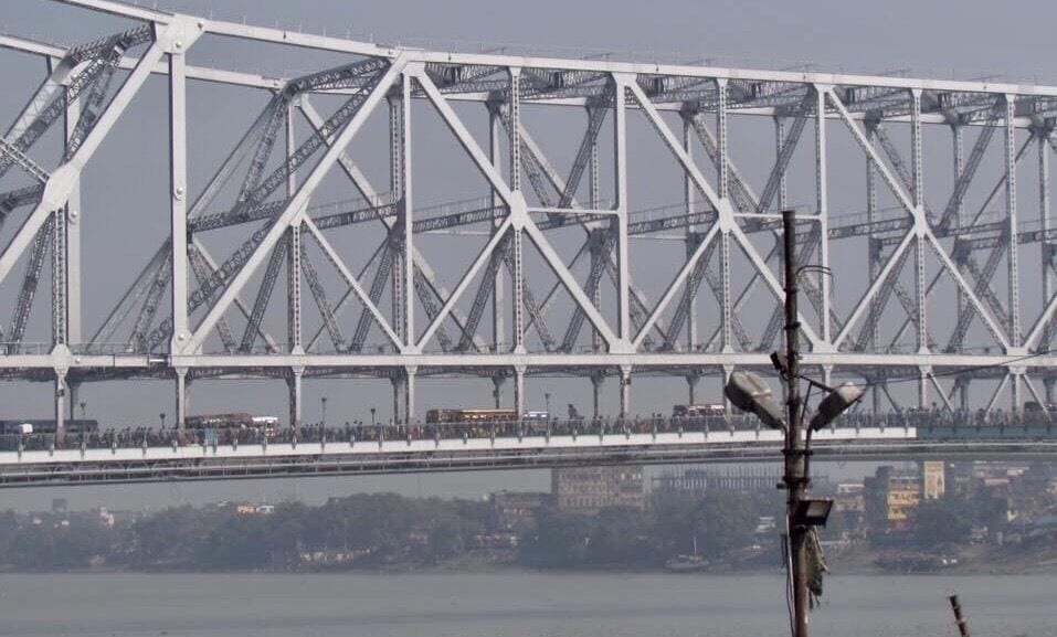 This bridge is so fully packed with people, animals and vehicles. There is a great view of the flower market near the far side from the train station. 
#UrbanJungle