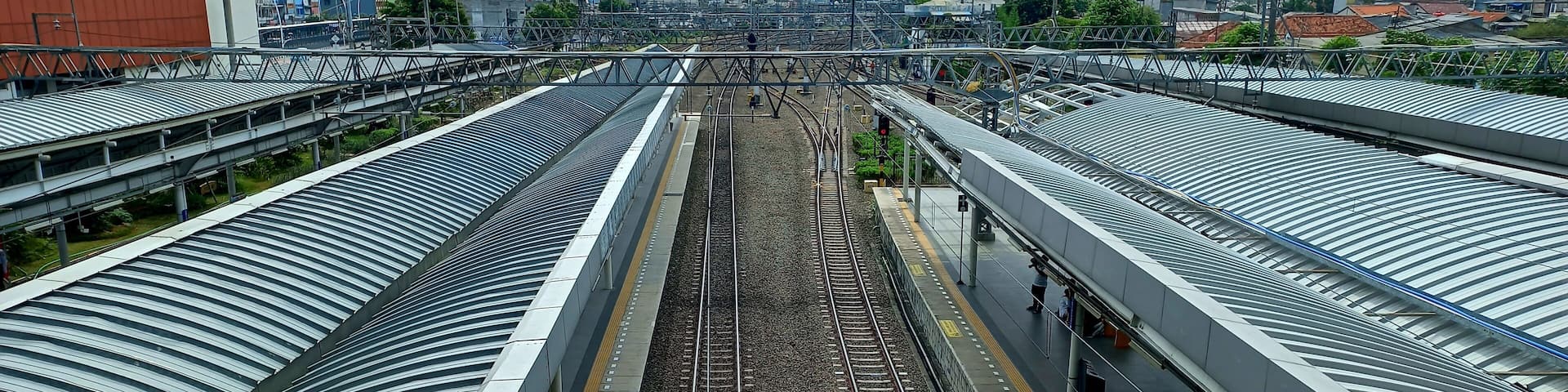 Jakarta, Indonesia - October 12, 2024. The train tracks and platforms at Jatinegara Main Station.