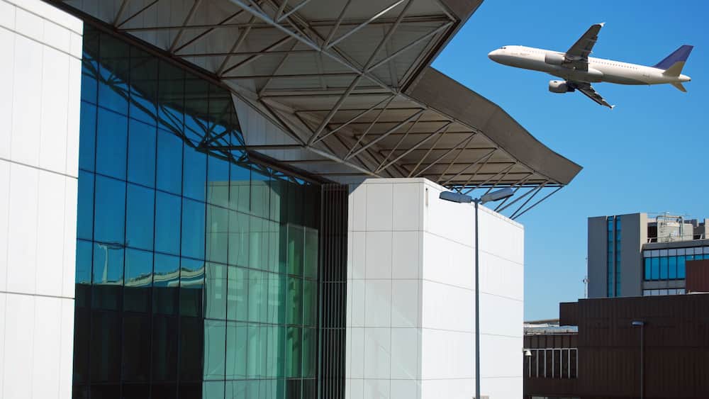 Takeoff of an airplane and architecture of the airport of Fiumicino, Shutterstock ID 62584459, SF SSA Case with Manager Approval: Case 07151371, Job: Prepay credit, Client/Licensee: , Other: