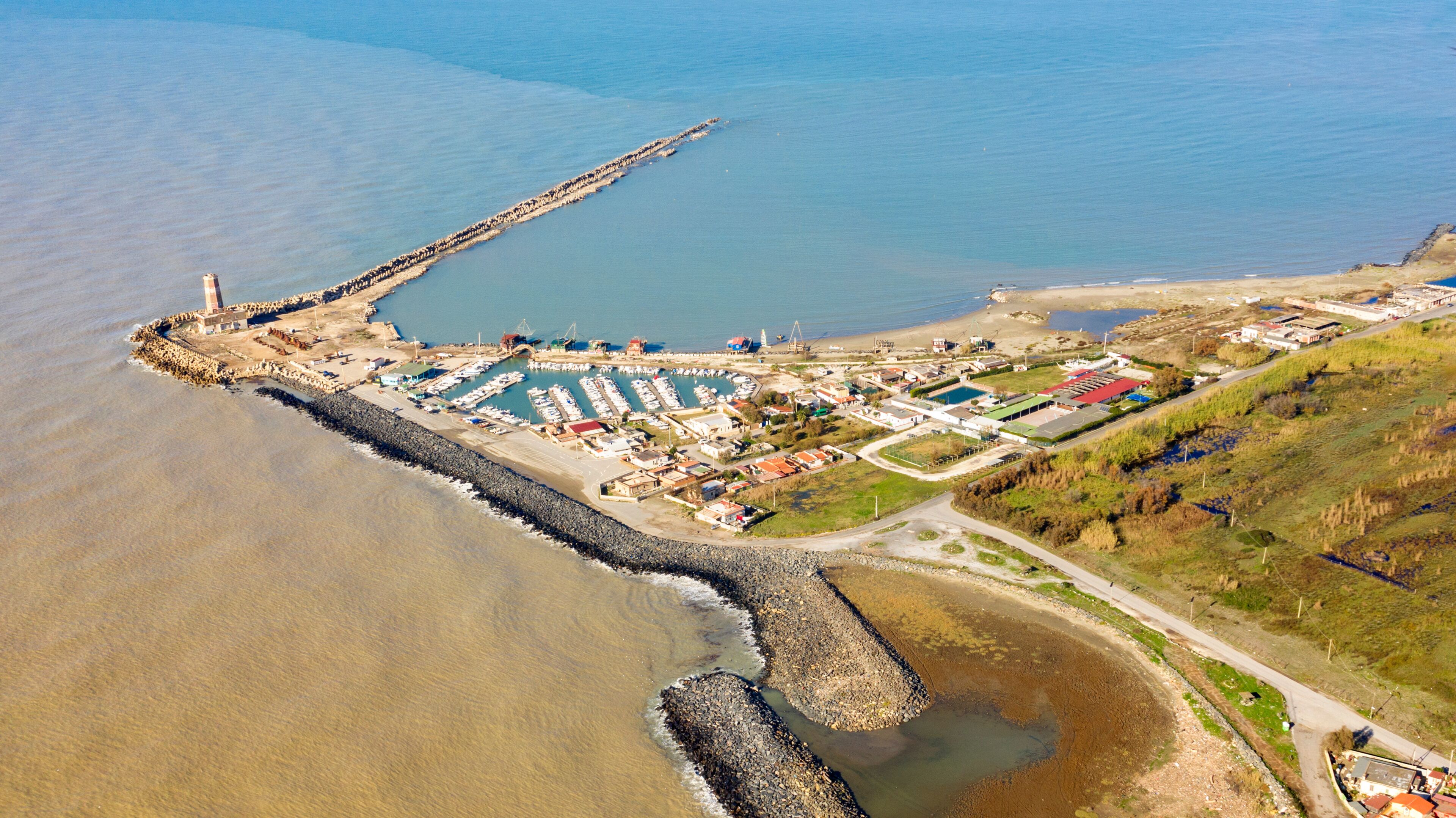 Aerial view of the port with the fishing rigs of Fiumicino, near Rome, Italy.