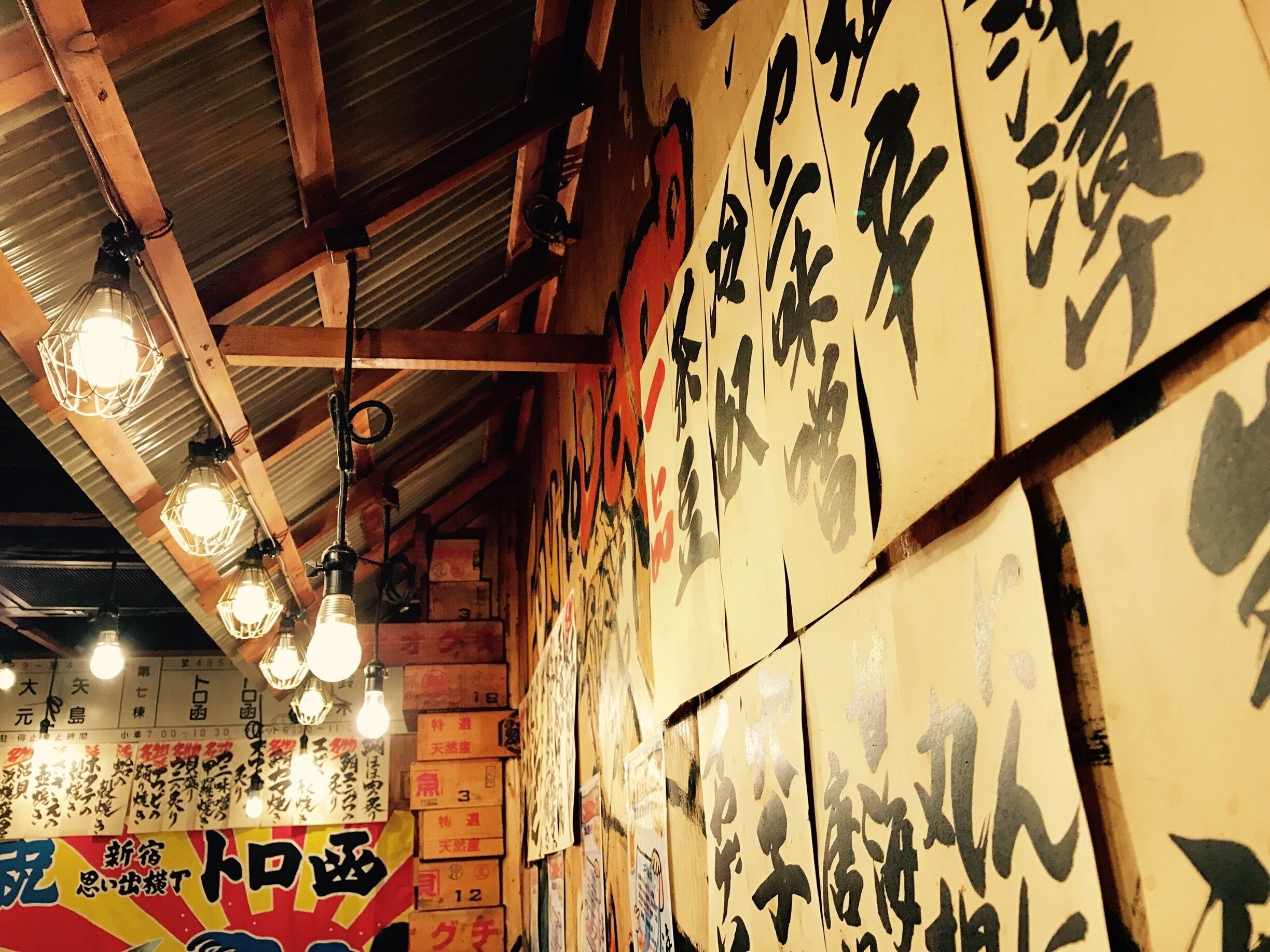 Torobako is a fisherman themed bar/ restaurant in Omoide Yokochou 2 min from Shinjyuku Station. They specialise in fish and clams and each table has a small grill to cook clams and fish. It's fun and delicious. If it wasn't for the first young waitress being rude I would have given it 5 stars. Price was fairly reasonable as well :)