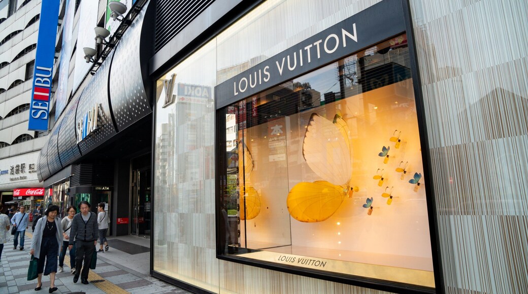 Toshima which includes signage and street scenes