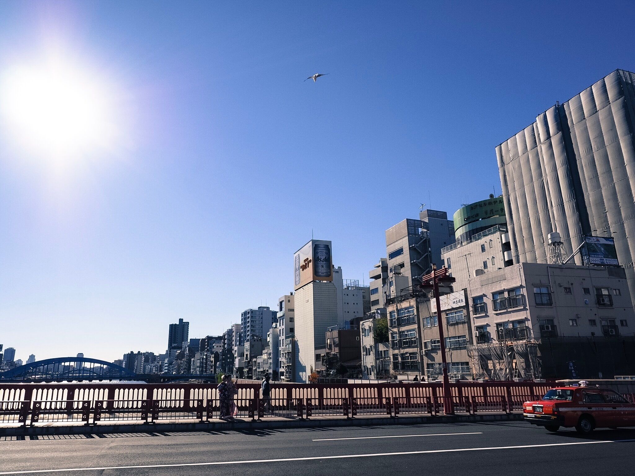 We live under the same sun - Wander around Asakusa in winter and you will see blue sky with no cloud.