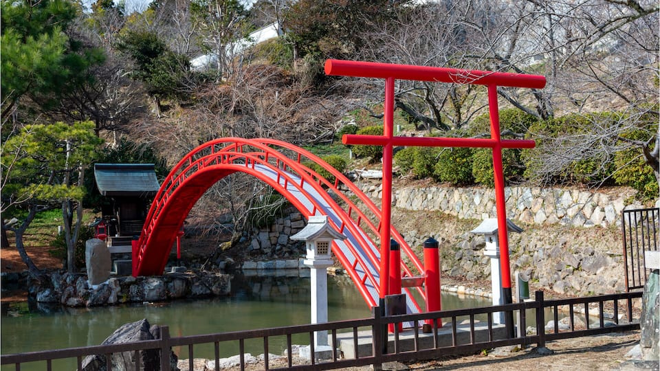 An arched bridge in the garden on Kannoji temple in Nishinomiya, Hyogo, Japan