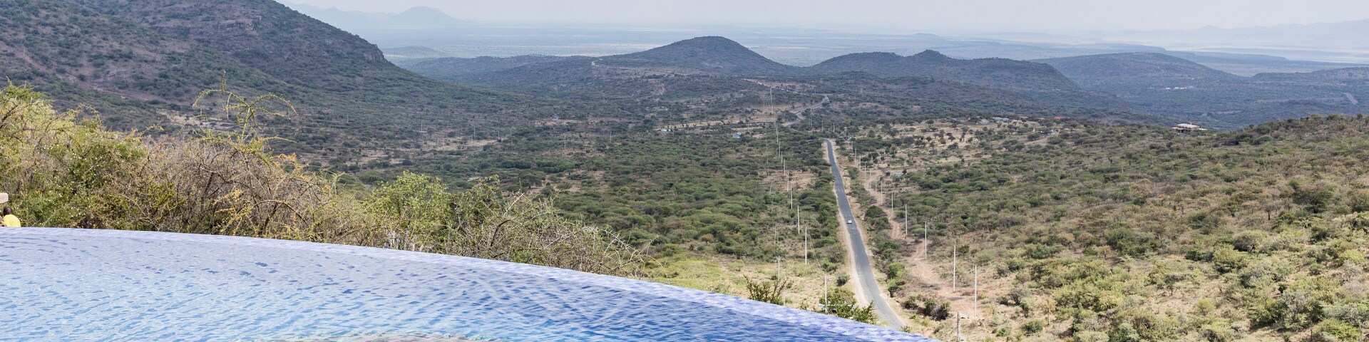 Swimming pool over the Magadi Highway Road in the middle of the forest Ol Talet Cottages off magadi road below olepolos country club, Kiserian Great rift valley Kajiado County Kenya East AFrica