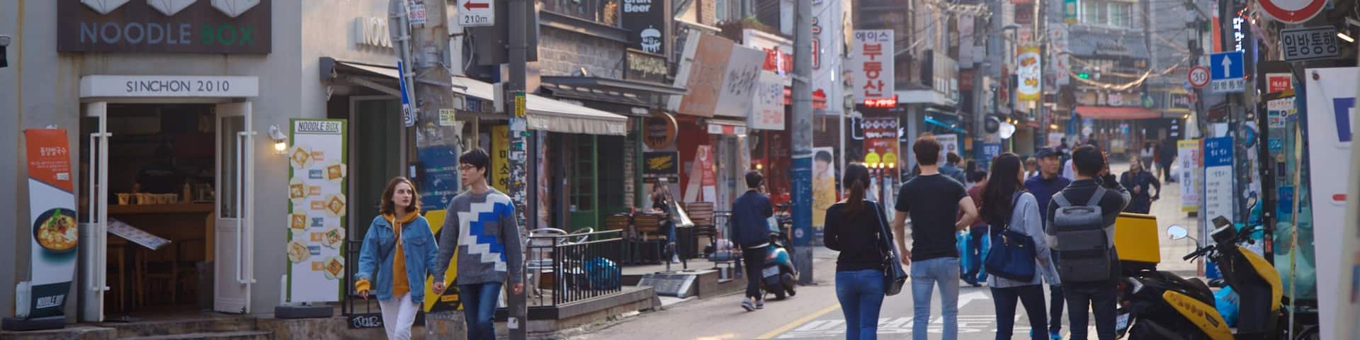 Seodaemun-gu showing a city and street scenes as well as a couple