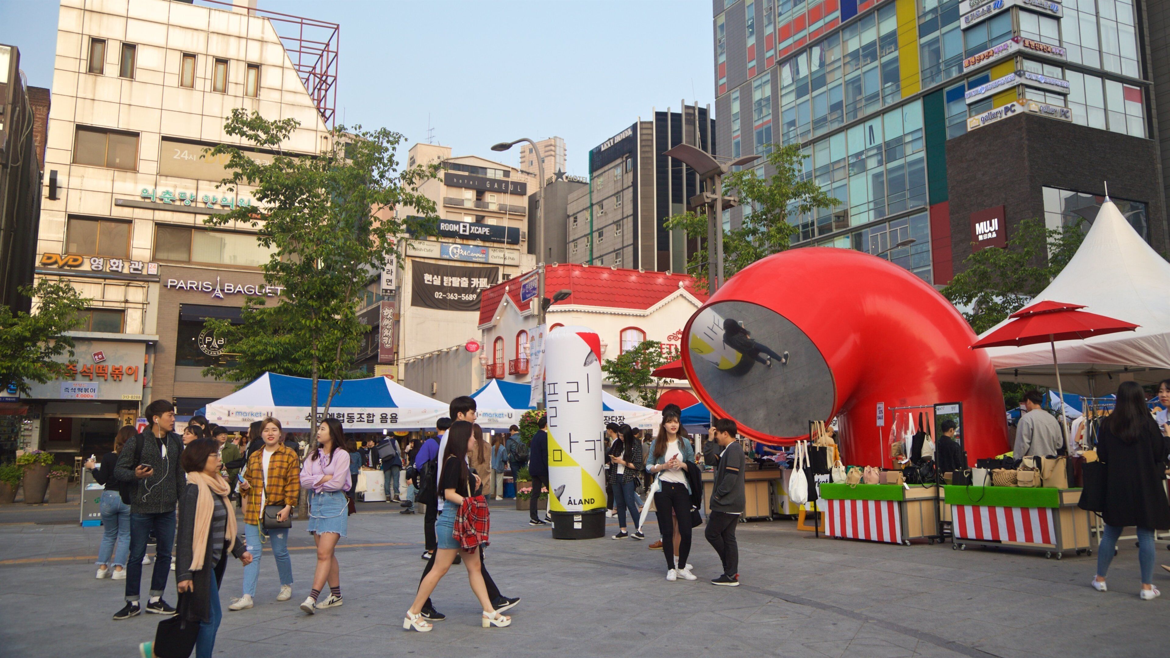 Seodaemun-gu which includes a city and street scenes as well as a small group of people