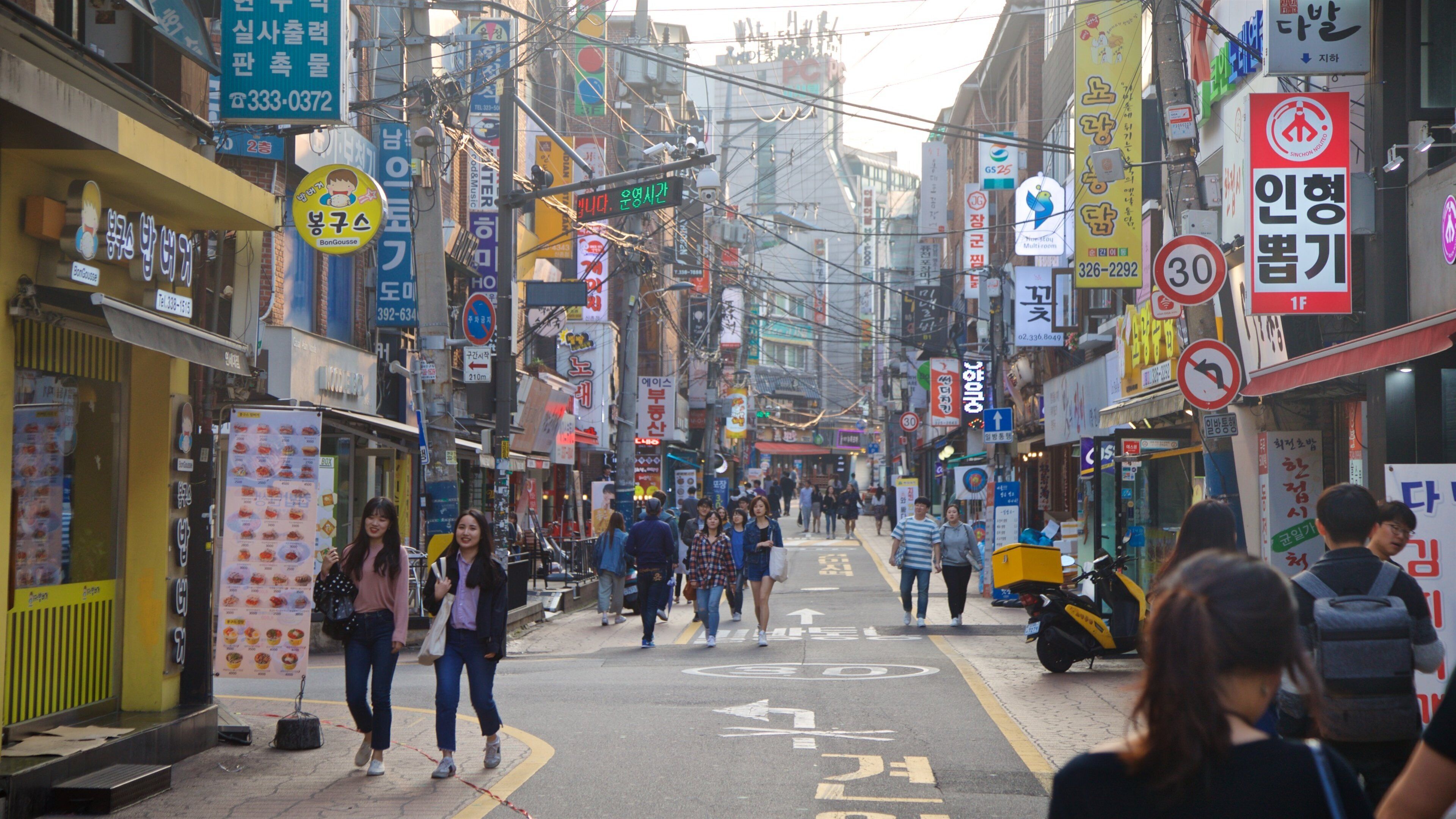 Seodaemun-gu featuring street scenes and a city as well as a couple