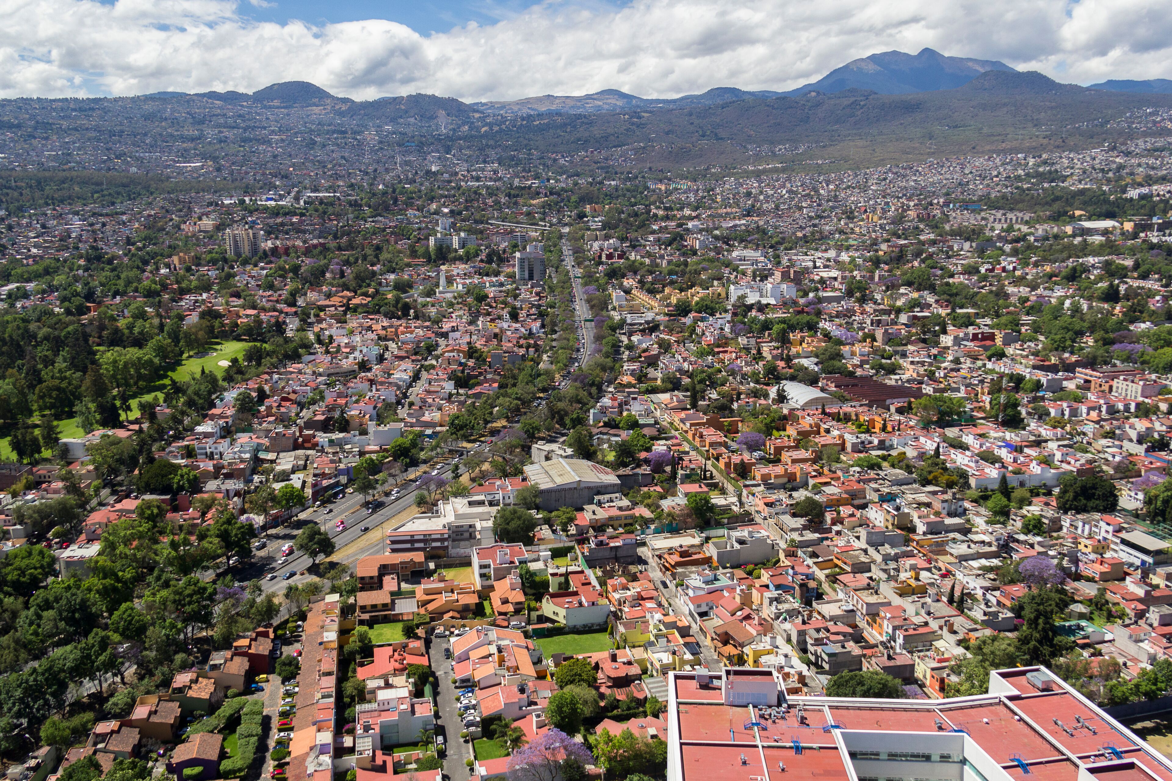 Aerial view of the Mexican district Tlalpan, in the south of Mexico City, with the viaduct and Mexican Golf Club, in the back the mountain Ajusco