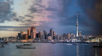 Day to night time slice of the Auckland City skyline running from the afternoon, through sunset, to early evening. View from Northcote Point, across the Waitemata harbour to Auckland, New Zealand.