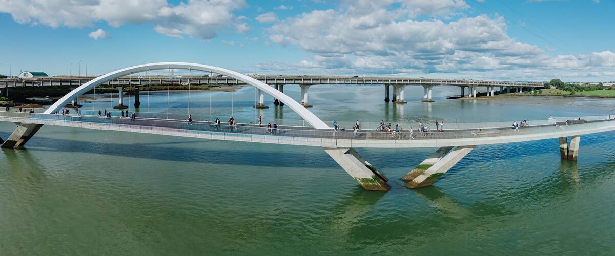 People on the Nga Hau Mangere Bridge in the Manukau Harbour, Mangere, Auckland, New Zealand.