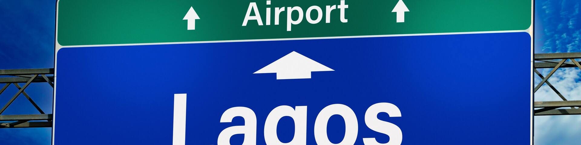 Road sign indicating direction to the city of Lagos