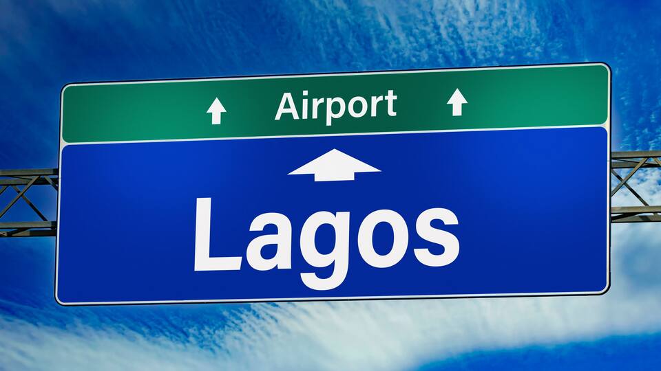 Road sign indicating direction to the city of Lagos