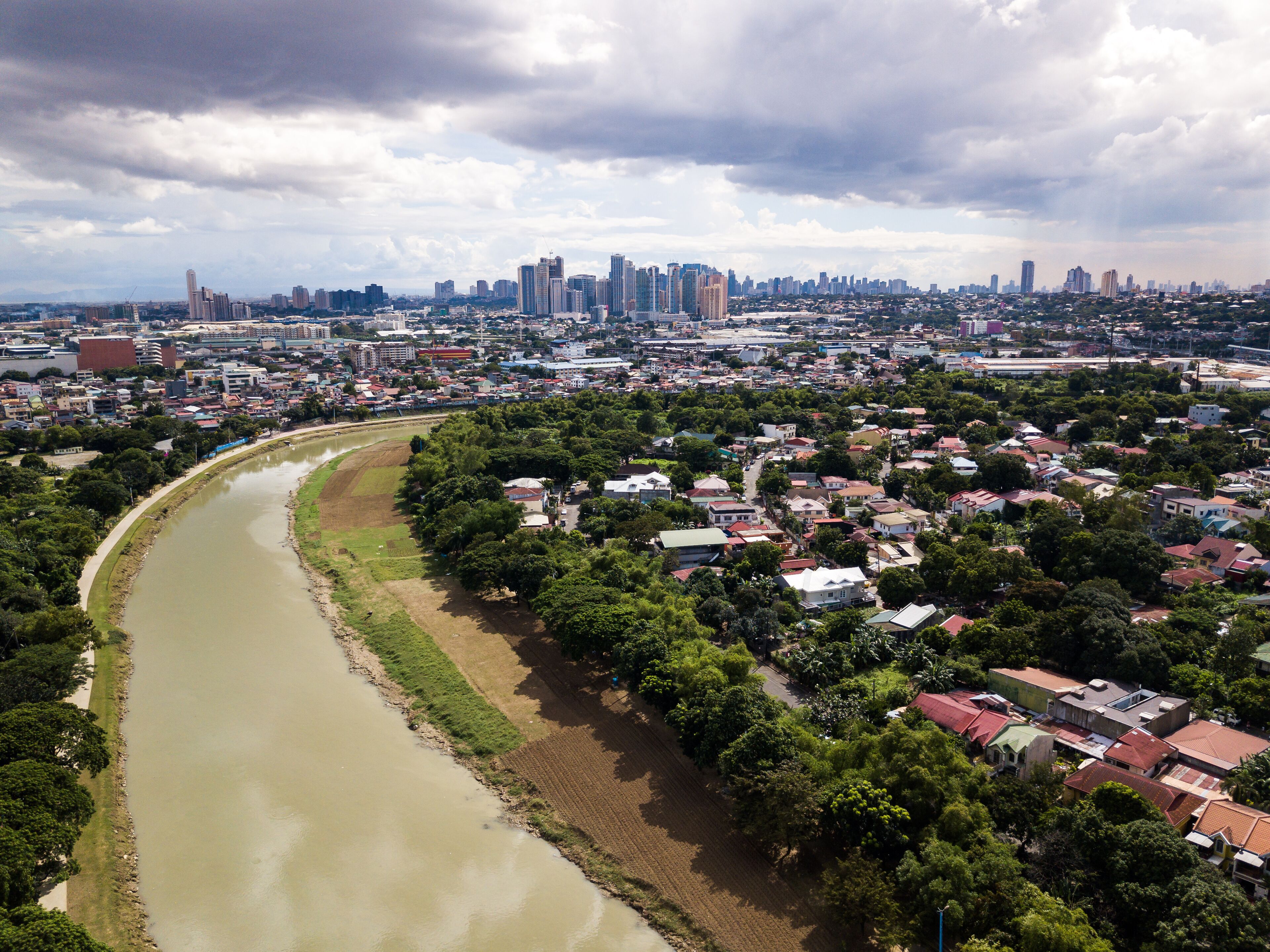Scenic Drone Aerial Picture of the Marikina River and the Skyline of Eastwood City in Metro Manila, Philippines
