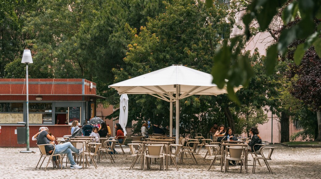 Areeiro which includes outdoor eating as well as a small group of people