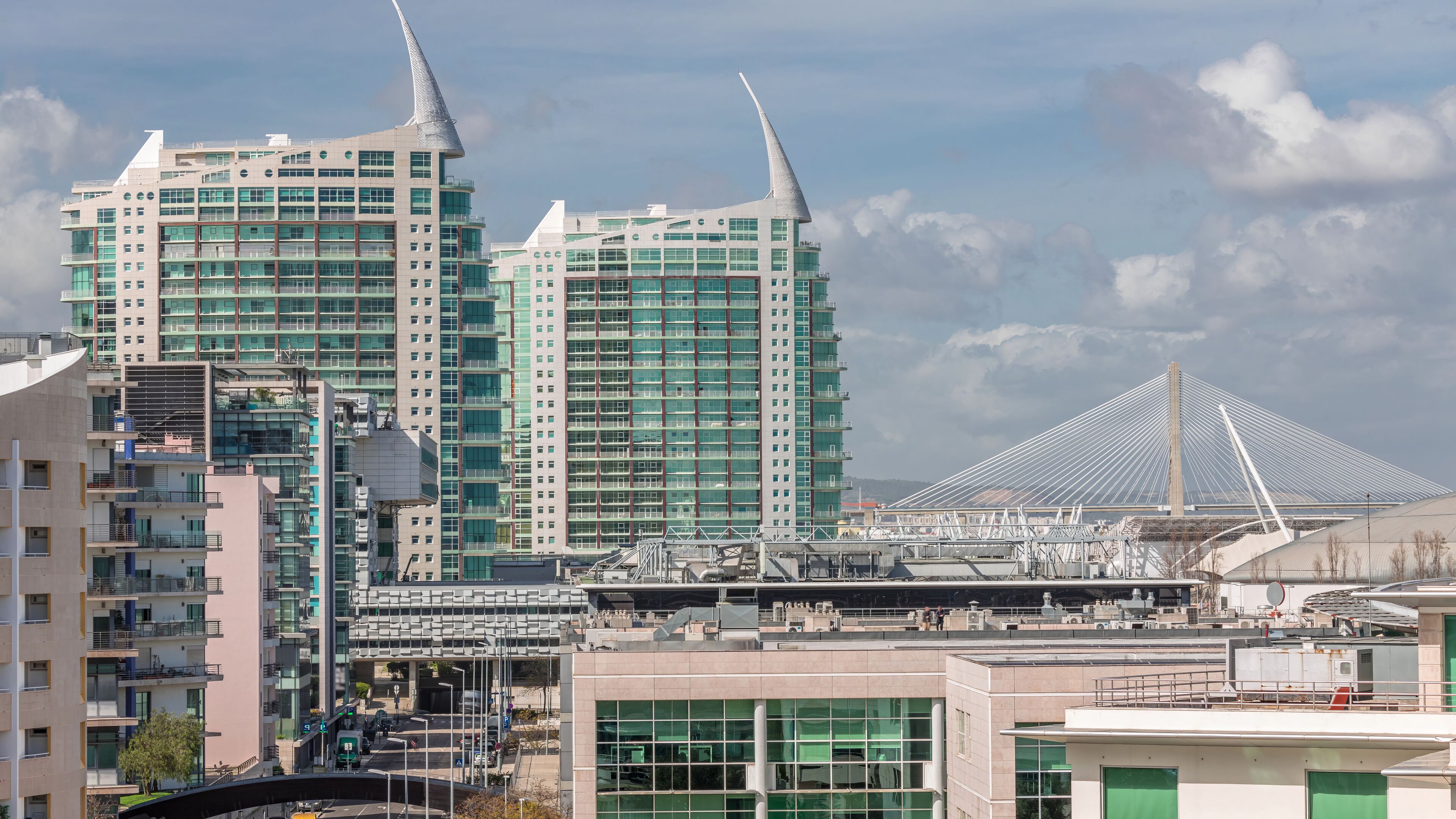 The Parque das Nacoes or Park of Nations modern neighborhood with skyscrapers aerial timelapse in Lisbon. Portugal