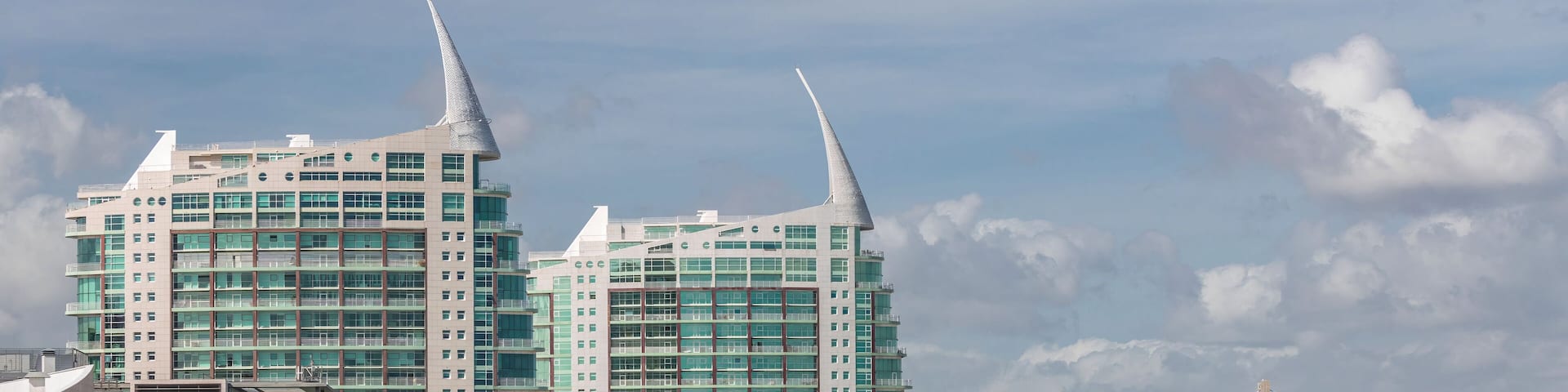 The Parque das Nacoes or Park of Nations modern neighborhood with skyscrapers aerial timelapse in Lisbon. Portugal