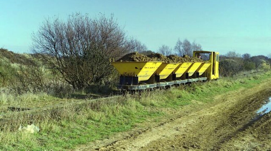 Supplies by rail for Star Lane brickworks Five skips of brickearth are propelled towards the works from the stockpiles. Actual digging of clay seemed to have finished at this date, but there were enormous stockpiles some distance from the works. Five skips were standard here, but at the same company's Cherry Orchard Lane works three was usual, despite both lines being practically level and with similar locomotives.
