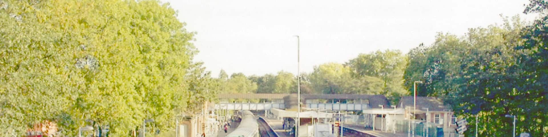 Wandsworth Common Station. View SE, towards Balham, East Croydon etc.: ex-LB&SCR London Victoria - Clapham Junction - East Croydon and Brighton etc. main line. A Down local train is leaving Platform 1, possibly for London Bridge via Streatham Hill.