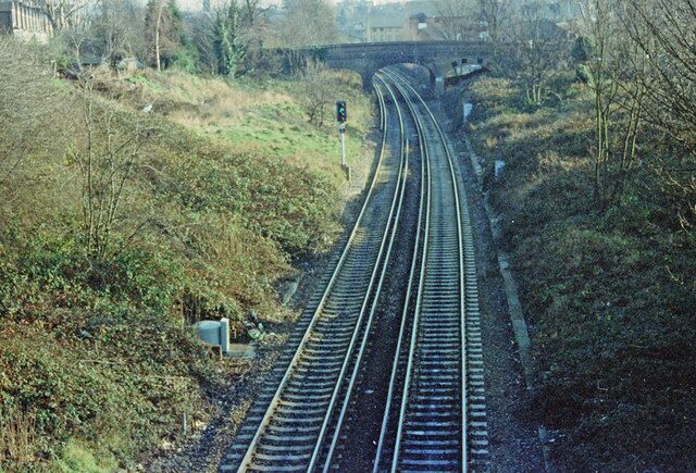 The Railway towards Lewisham Photo taken c1997 from the footbridge between Drakefell Road and St. Asaph Road. The bridge in the distance carries Avignon Road over the railway.