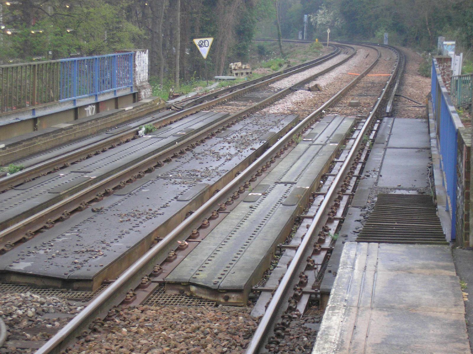 A bridge from East Dulwich railway station in London, England, UK, crossing over East Dulwich High Street below.