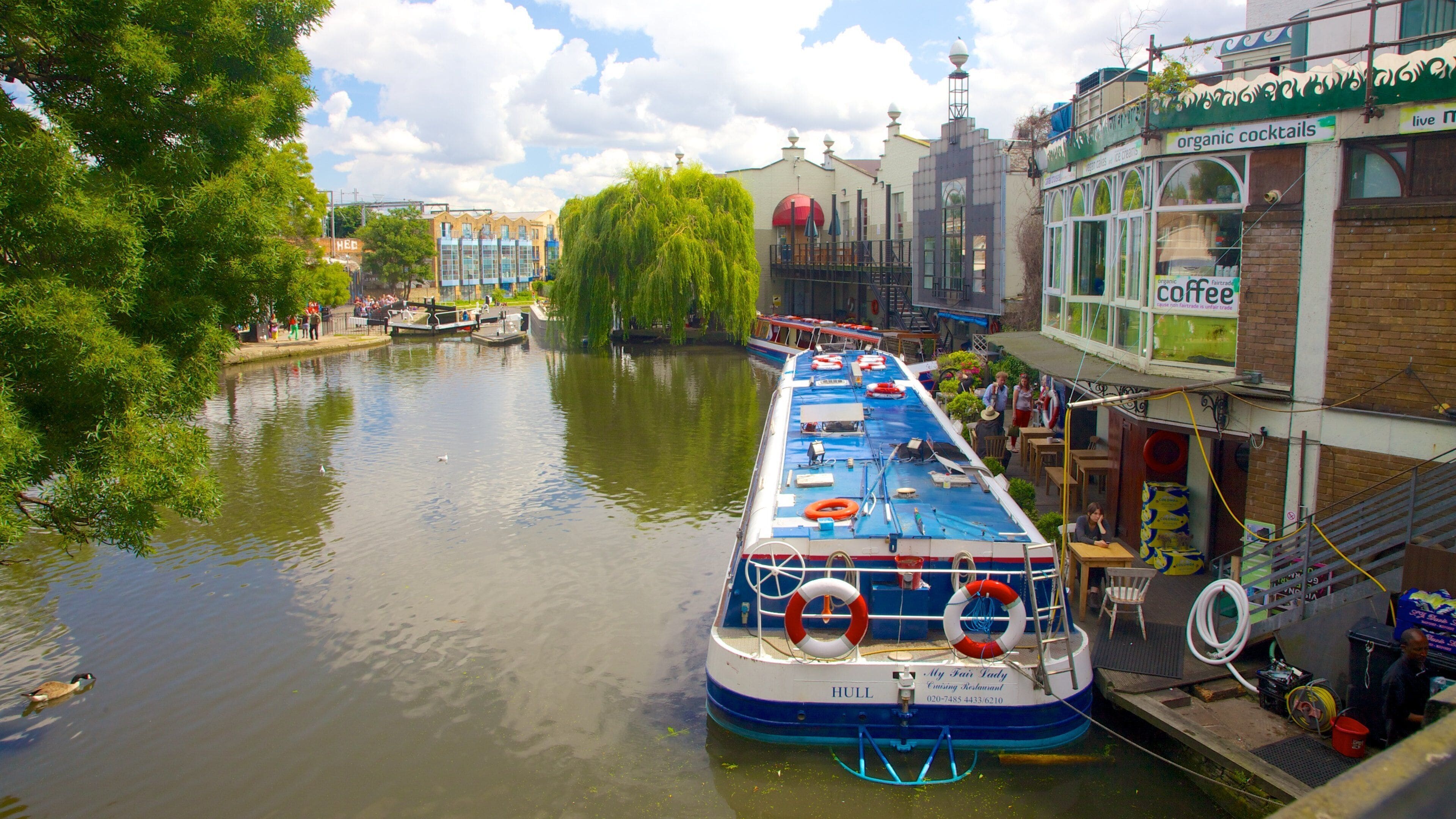 Camden Town showing a river or creek and boating