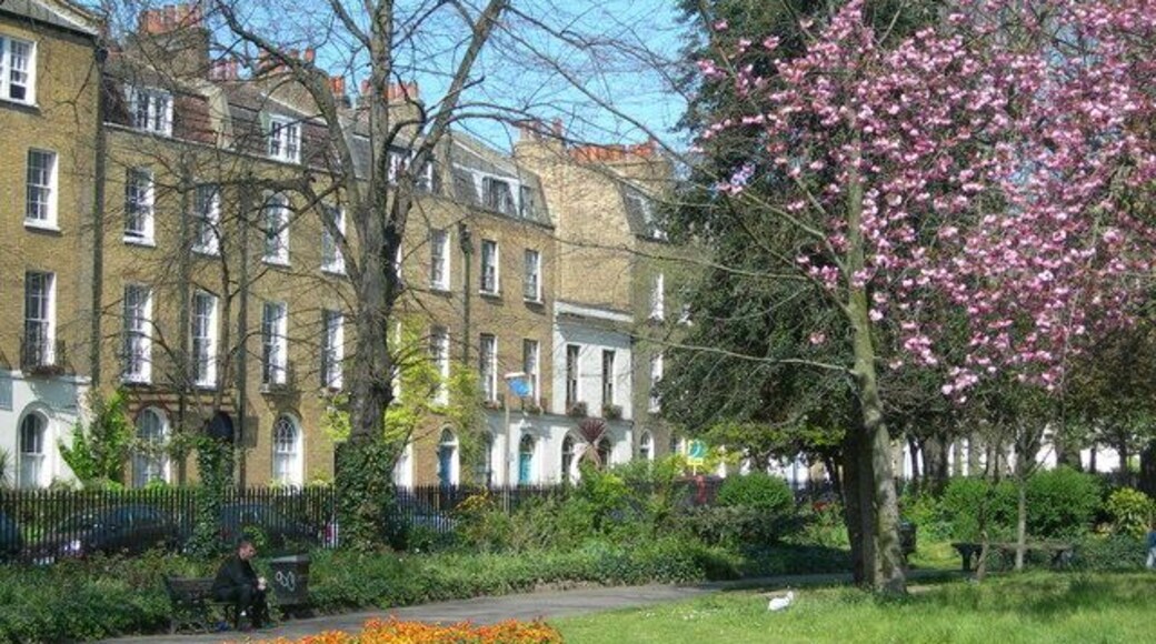 Clapton Square, Hackney, London. Showing the park and some houses on the road around it.