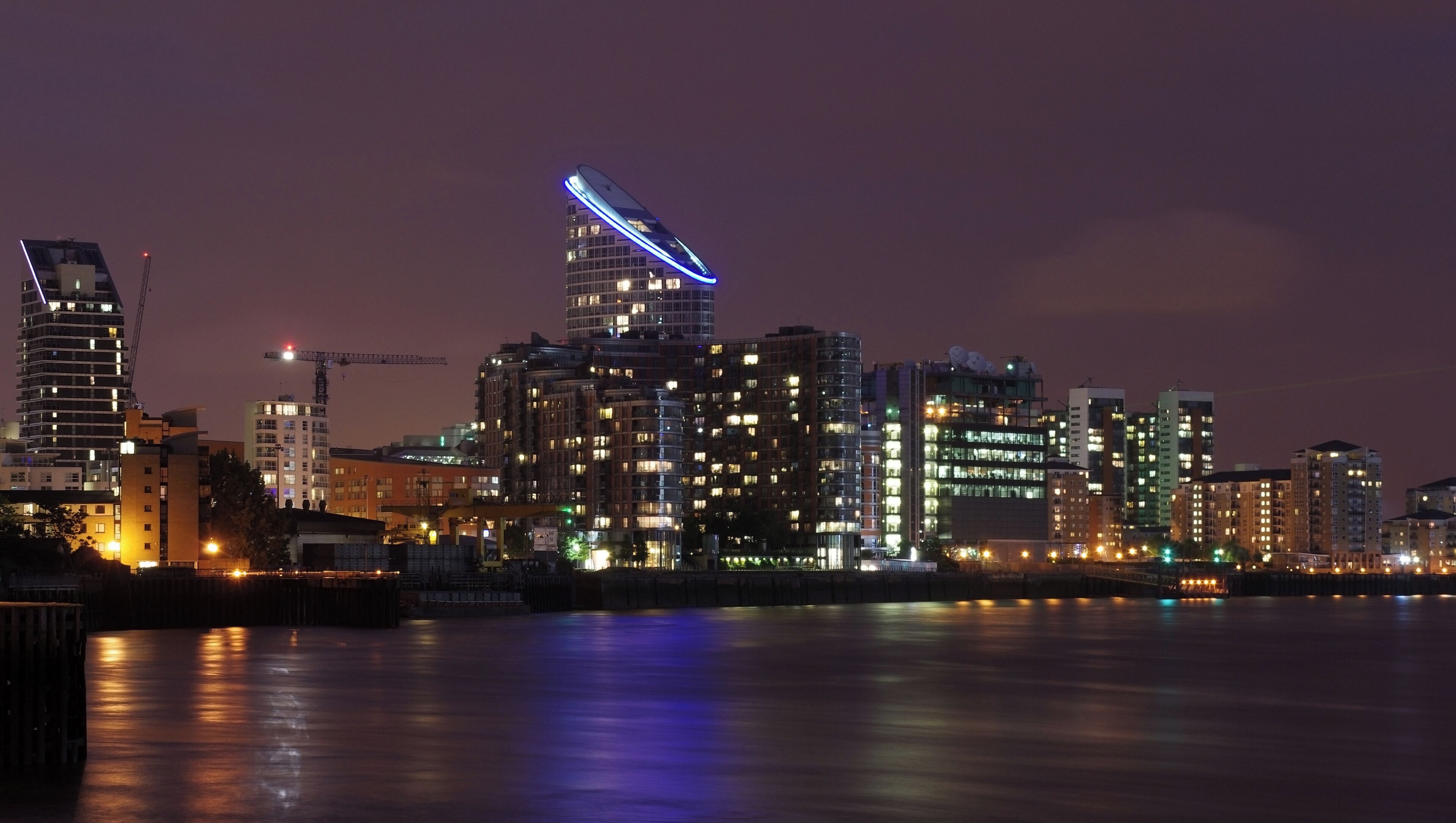 Ontario Tower and New Providence Wharf seen from the banks of the Thames near Galleons View.