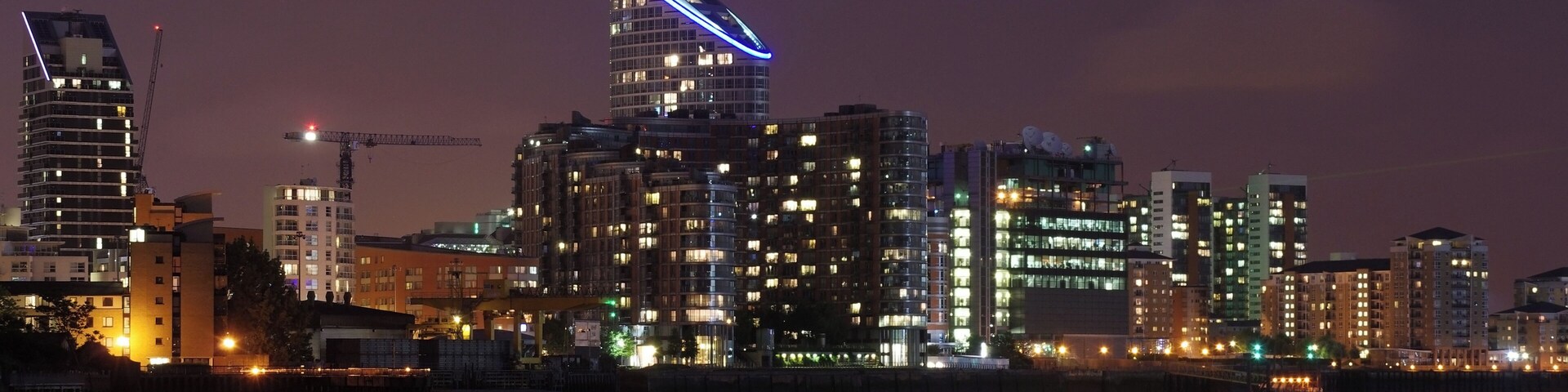 Ontario Tower and New Providence Wharf seen from the banks of the Thames near Galleons View.