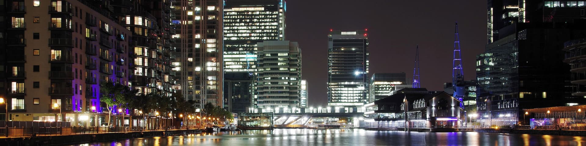 Looking north over Millwall Dock at night, towards South Quay.