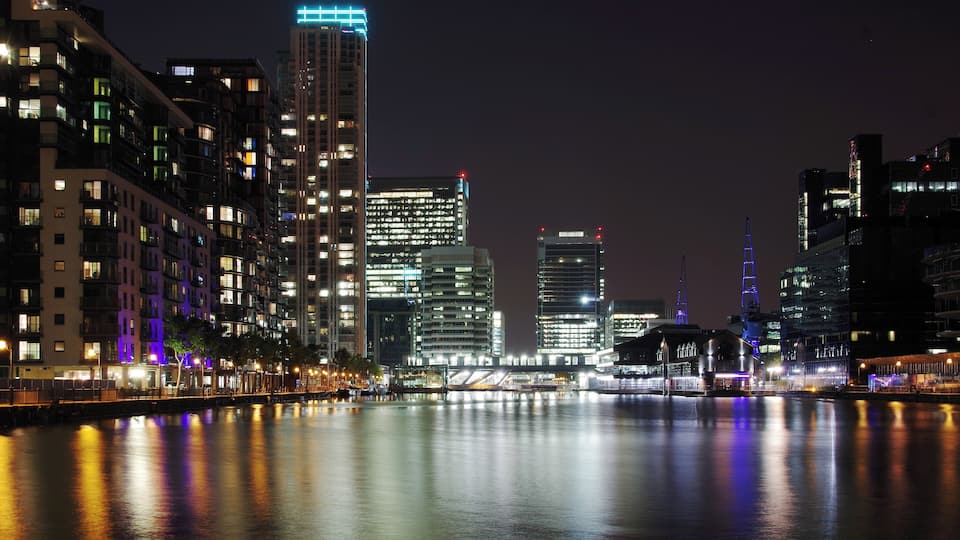 Looking north over Millwall Dock at night, towards South Quay.