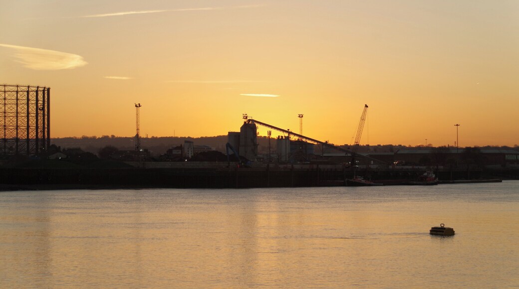 Looking across the River Thames as the sun rises on a clear December morning. This was taken from near the eastern end of the City Canal.