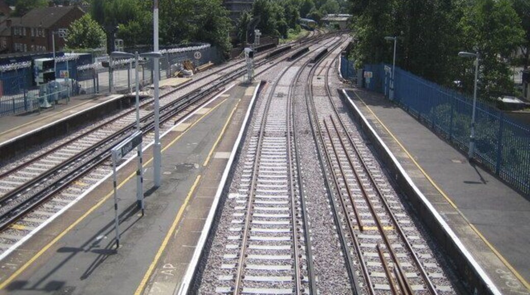 Tulse Hill railway station Original description: Tulse Hill railway station Looking from the footbridge on the station over the freshly ballasted tracks towards the junction south of the station. A Southern train bound for West Norwood is just disappearing around the corner to the left, while the tracks to the right themselves split and go to Streatham and Streatham Hill stations respectively.