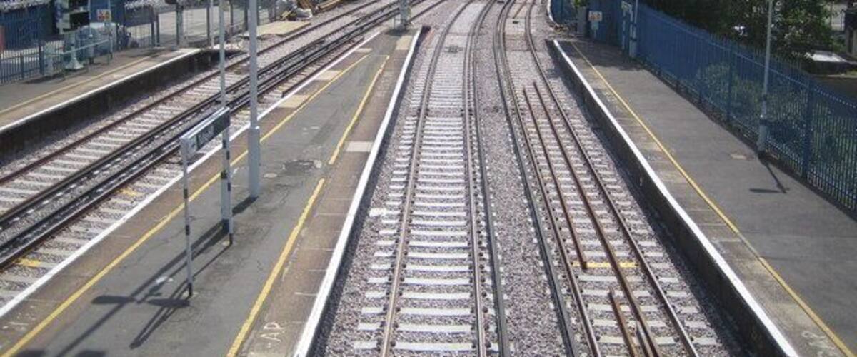 Tulse Hill railway station Original description: Tulse Hill railway station Looking from the footbridge on the station over the freshly ballasted tracks towards the junction south of the station. A Southern train bound for West Norwood is just disappearing around the corner to the left, while the tracks to the right themselves split and go to Streatham and Streatham Hill stations respectively.