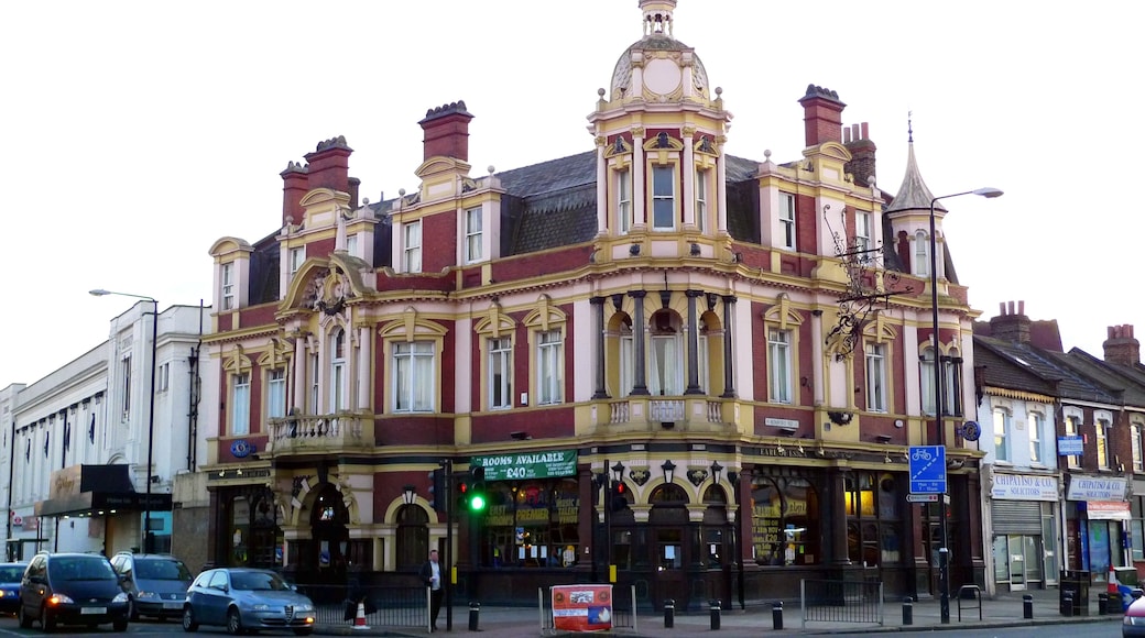 A grand pub building on a busy intersection. There's some nice ironwork on that hanging sign. Address: 616 Romford Road. Owner: Courage (former). Links: Beer in the Evening Dead Pubs (history)