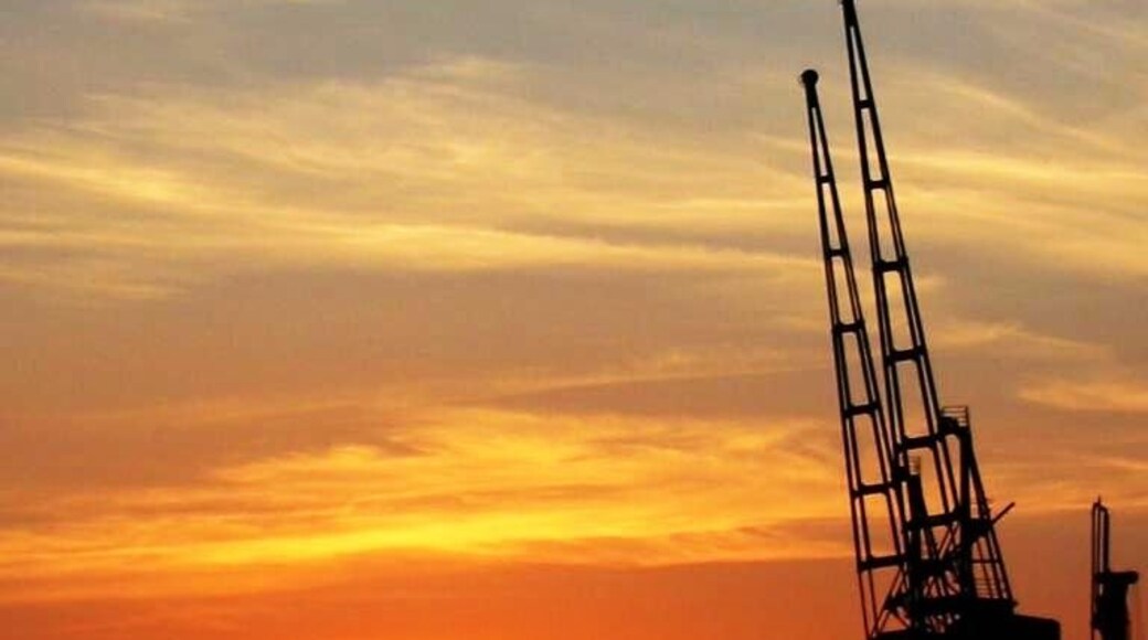 Reuters Meridian building and RVD cranes salute the evening sun