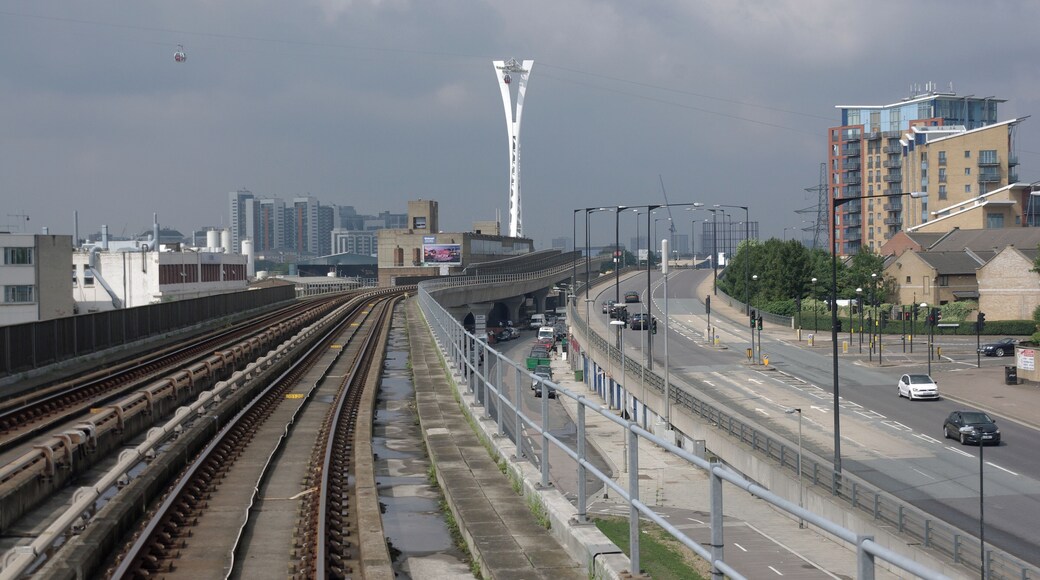 Looking west along the Docklands Light Railway near West Silvertown with the Emirates Airline in the background.
