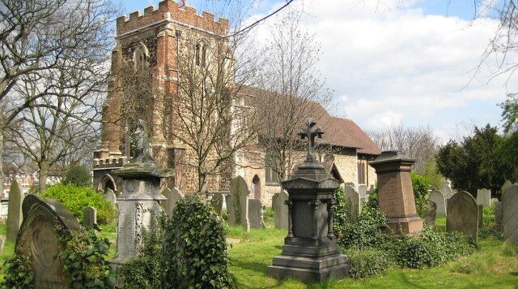 East Ham: Church of St Mary Magdalene, near to Beckton, Newham, Great Britain. There has reputedly been a church on this site since before the Norman Conquest of 1066 although the present church is thought to date from no earlier than the first half of the 12th century. The tower probably dates from the early 13th century, but has been much restored. The church suffered from bomb damage in 1941, including the loss of all of its stained glass windows. The churchyard covers an area of about 9.5 acres but has recently been closed for burials. Since 1977 most of the churchyard has been left as a nature reserve, managed by the London Borough of Newham as East Ham Nature Reserve, although this area around the church is maintained for worshippers and weddings. The flag of St George is fluttering from the flagstaff on the tower.
