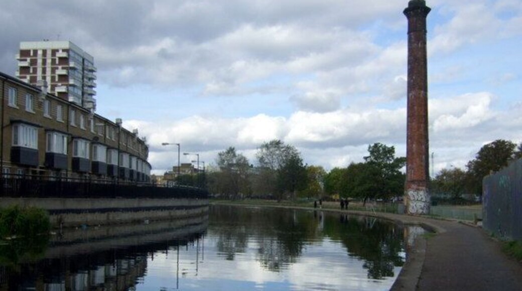 Regent's Canal approaching Mile End park The canal curves towards the west after Salmon Lane lock; the tall chimney seen here at the southern end of Mile End Park is an old sewer vent.