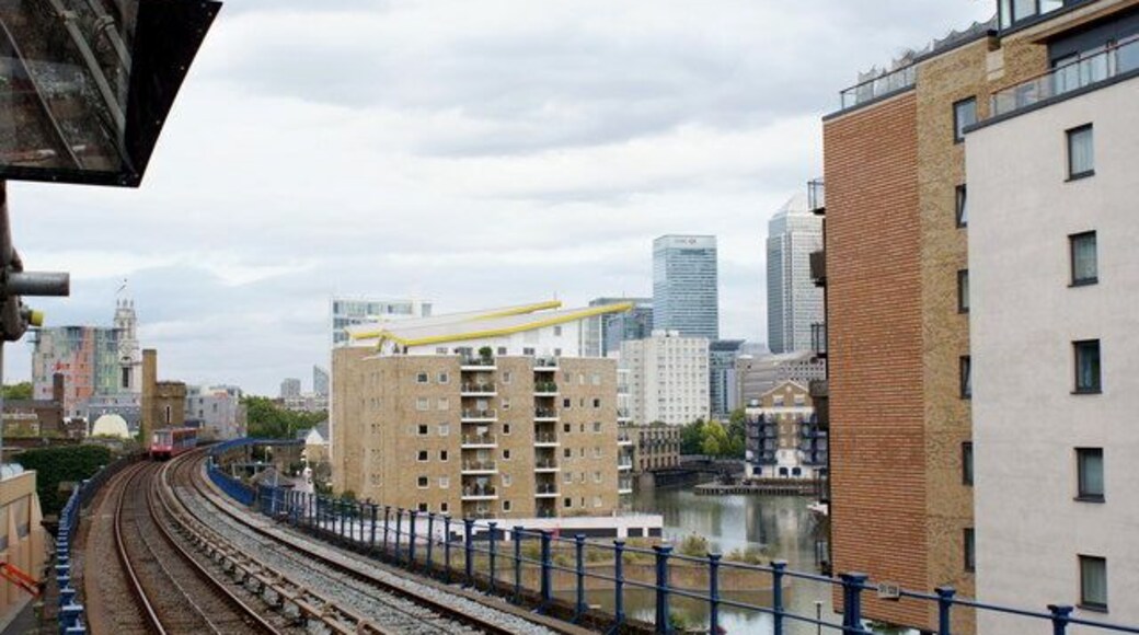 The Train Just Departed View from the DLR Limehouse station, as the train departs for East London. Limehouse basin can be seen to the right of the railway, and Canary Wharf is in the distance.