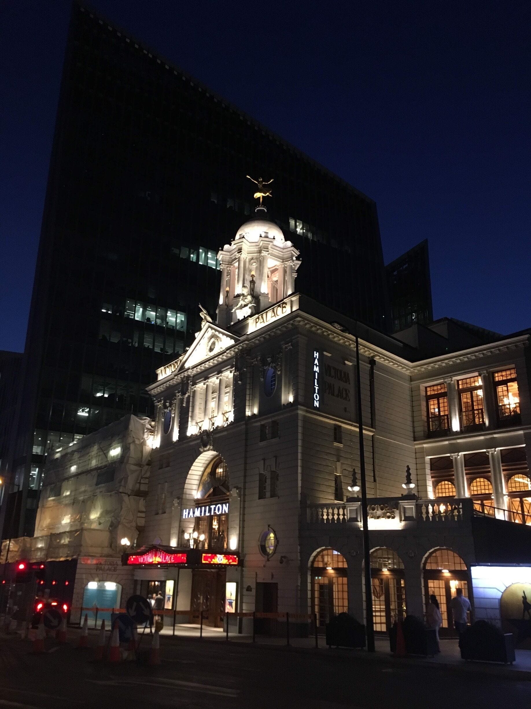 The Palace still stands tall with its old world glory amidst the modern glass buildings around it 