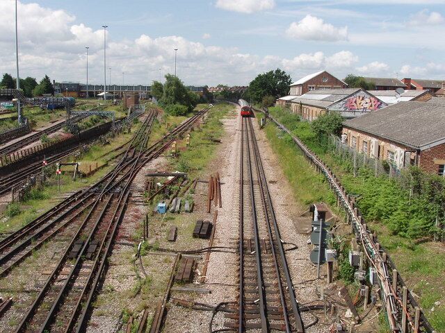 Piccadilly Line from Northfield Avenue On the right are the through lines with a tube train coming from Heathrow. On the left lines go into the Northfields tube depot.