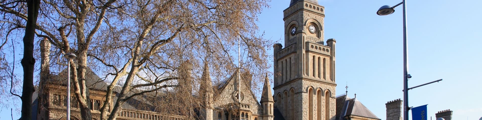 Ealing Town Hall (1888). Architect: Charles Jones. Situated on the Uxbridge Road, Ealing, W5 London, United Kingdom. The wing sightly recessed back on the right-hand side (partly obscured by a black lamp post) is a latter addition to the original building. Part of the upper building and roof was badly damaged some years ago by fire. Behind the tree on the far left at the back of the offices is the Victoria Hall. Original council office building still stands 500 yards further east on the same side of the road.