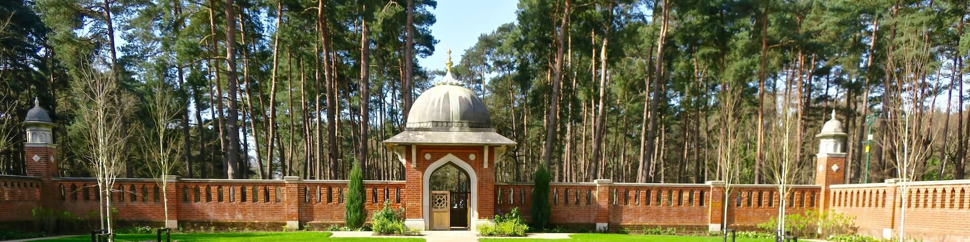 Muslim Burial Ground Peace Garden. The original Woking Muslim Military Cemetery was opened in 1917 by the British Government to counteract German propaganda After falling into disuse, it became overgrown and vandalised. It was listed in 1984 by English Heritage as a Grade II structure. Restoration efforts began in the 1990s, and eventually The Peace Garden was officially opened in November 2015.
